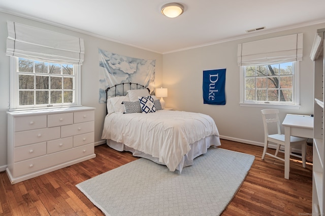 6 Wahackme Ln, New Canaan, CT 06840 - bedroom featuring baseboards, ornamental molding, wood finished floors, and visible vents
