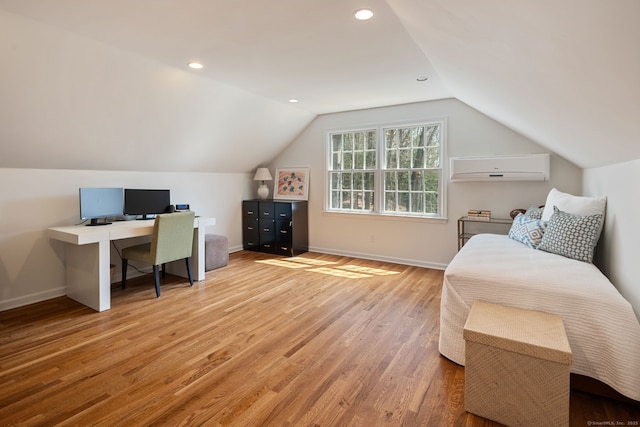 6 Wahackme Ln, New Canaan, CT 06840 - office featuring an AC wall unit, baseboards, vaulted ceiling, and light wood-type flooring