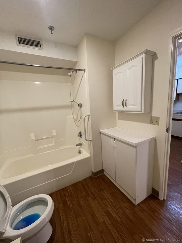 75 Washington Ave Unit 4207, Hamden, CT 06518 - full bathroom with toilet, wood finished floors, bathing tub / shower combination, and baseboards