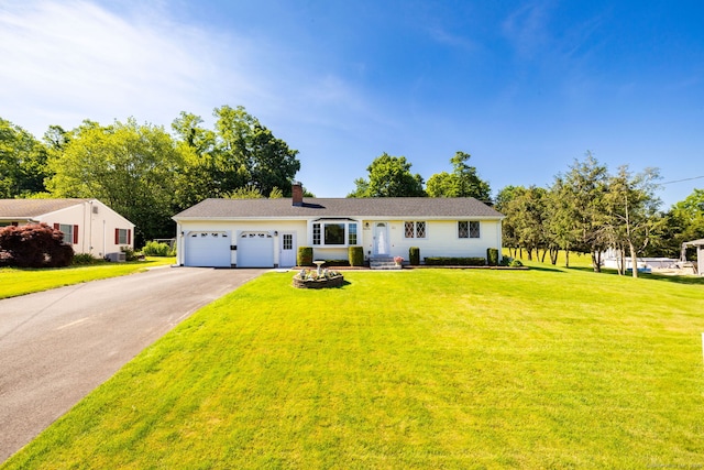 31 Mountain View Dr, Rocky Hill, CT 06067 - view of front of home featuring driveway, a chimney, a garage, and a front lawn