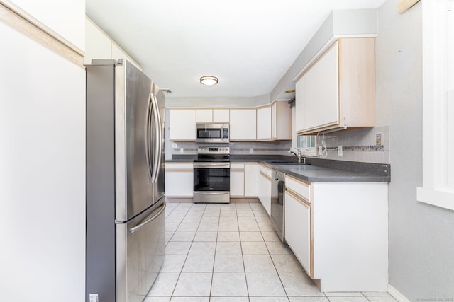 31 Mountain View Dr, Rocky Hill, CT 06067 - kitchen with stainless steel appliances, dark countertops, and tasteful backsplash
