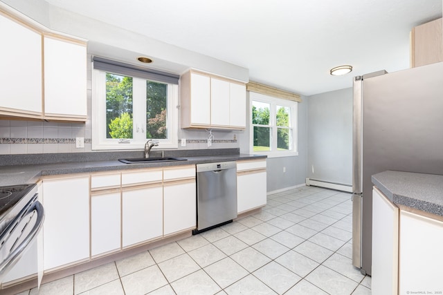 31 Mountain View Dr, Rocky Hill, CT 06067 - kitchen with stainless steel appliances, baseboard heating, backsplash, and dark countertops