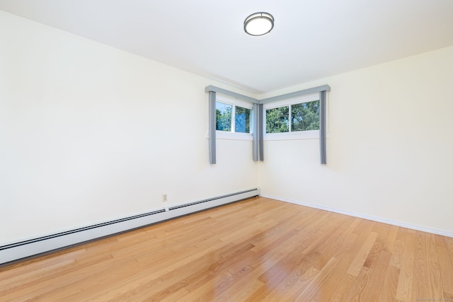 31 Mountain View Dr, Rocky Hill, CT 06067 - spare room with baseboard heating and wood finished floors