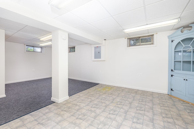 31 Mountain View Dr, Rocky Hill, CT 06067 - below grade area featuring a drop ceiling, electric panel, and light colored carpet