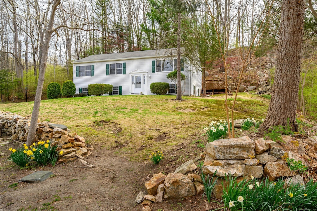 23 Oak Grove Rd, Brookfield, CT 06804 - bi-level home with a front yard
