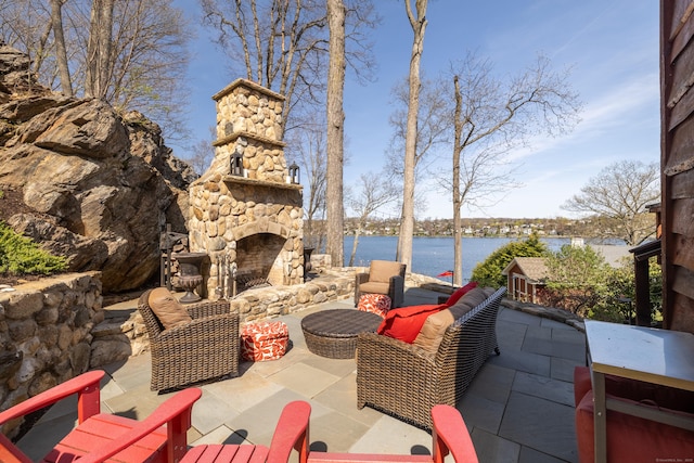 3 Willow Ln, New Fairfield, CT 06812 - view of patio / terrace with an outdoor living space with a fireplace and a water view