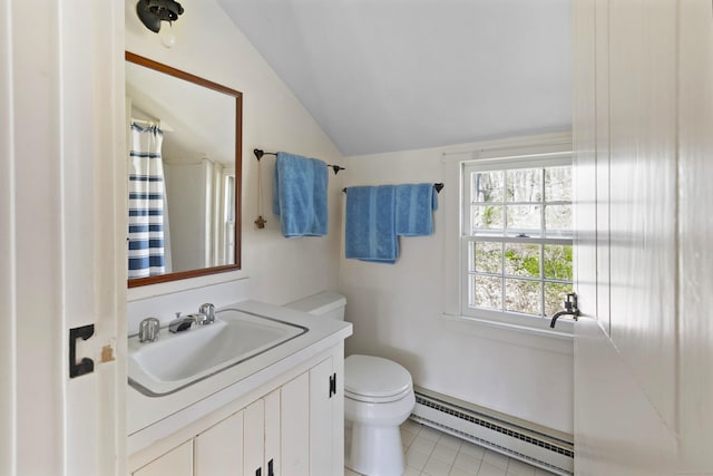 538 County Rd, Guilford, CT 06437 - bathroom with vanity, lofted ceiling, toilet, baseboard heating, and tile patterned floors