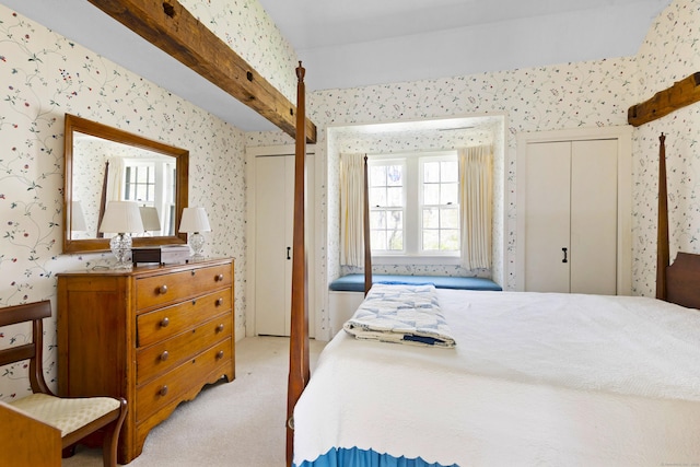 538 County Rd, Guilford, CT 06437 - bedroom with two closets, light carpet, and wallpapered walls