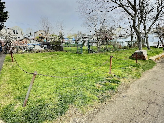 15 Beckett Ave, Branford, CT 06405 - view of property's community featuring a lawn, fence, and a residential view