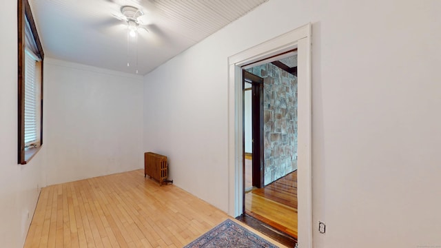 8 Kent St, Plainville, CT 06062 - unfurnished room with radiator and wood-type flooring