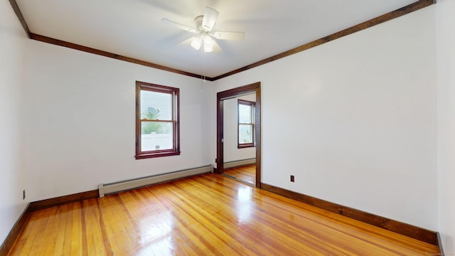 8 Kent St, Plainville, CT 06062 - empty room with baseboard heating, light wood finished floors, baseboards, a ceiling fan, and crown molding
