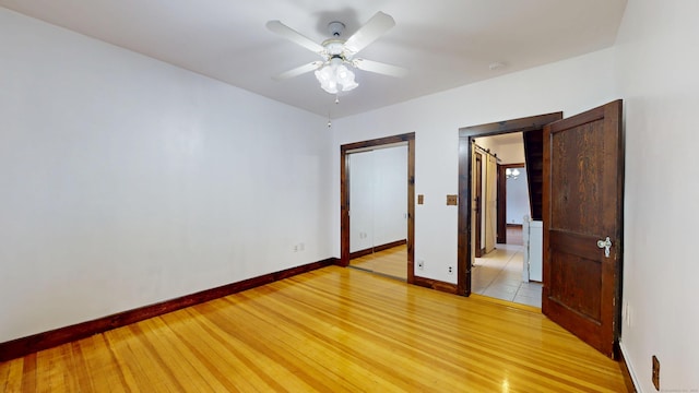 8 Kent St, Plainville, CT 06062 - unfurnished room featuring ceiling fan, light wood finished floors, and baseboards