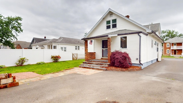 8 Kent St, Plainville, CT 06062 - view of front of property featuring a chimney