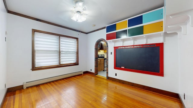 8 Kent St, Plainville, CT 06062 - unfurnished room with baseboard heating, hardwood / wood-style flooring, baseboards, and ceiling fan