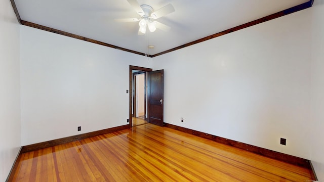 8 Kent St, Plainville, CT 06062 - unfurnished room with baseboards, hardwood / wood-style floors, a ceiling fan, and crown molding
