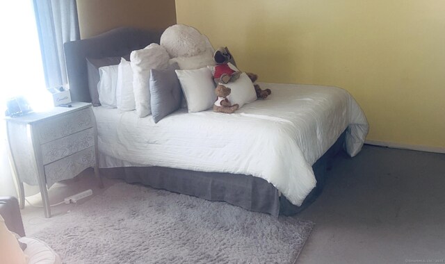 bedroom featuring carpet