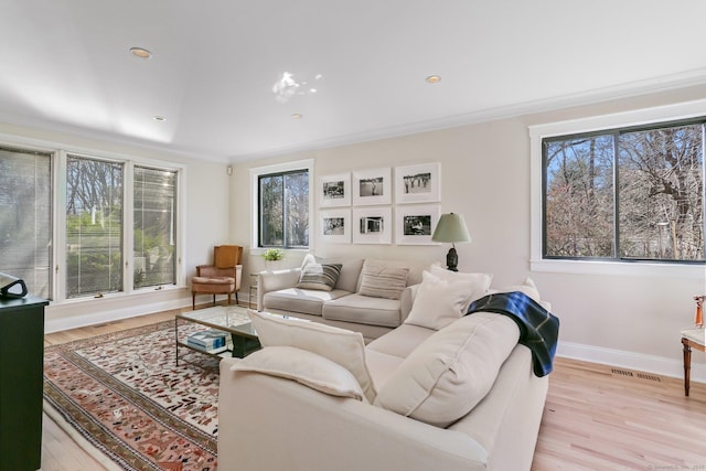 2 Donald Dr, Westport, CT 06880 - living area featuring healthy amount of natural light, light wood-type flooring, baseboards, recessed lighting, and ornamental molding