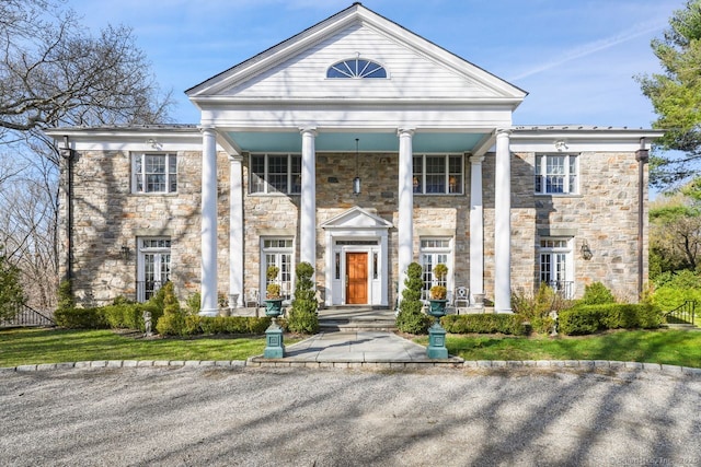 5 Northside Ln, Westport, CT 06880 - neoclassical / greek revival house featuring stone siding and covered porch