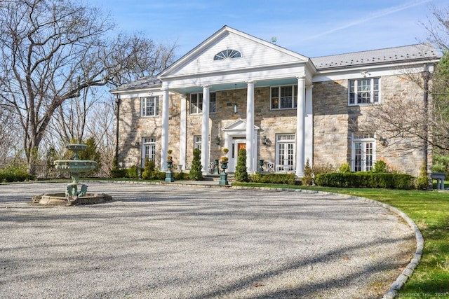 5 Northside Ln, Westport, CT 06880 - neoclassical / greek revival house featuring stone siding and french doors