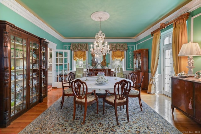 5 Northside Ln, Westport, CT 06880 - dining room featuring a chandelier, ornamental molding, and wood finished floors
