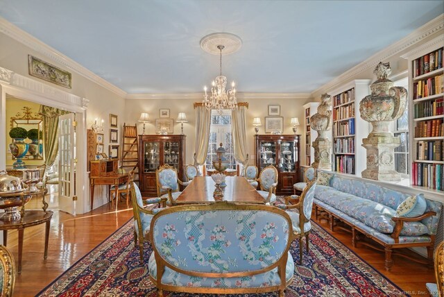 5 Northside Ln, Westport, CT 06880 - living area featuring a chandelier, wood finished floors, and ornamental molding