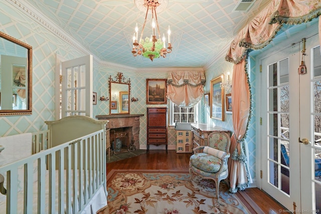 5 Northside Ln, Westport, CT 06880 - hall with wood finished floors, ornamental molding, a chandelier, and wallpapered walls