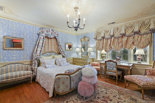 5 Northside Ln, Westport, CT 06880 - bedroom with a chandelier, wallpapered walls, wood finished floors, crown molding, and wainscoting