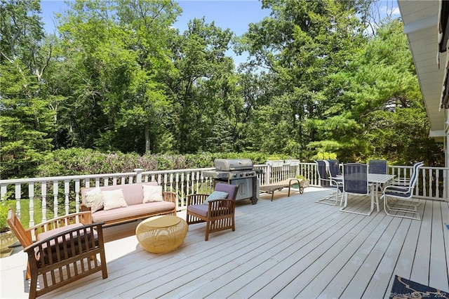 41 Hermit Ln, Westport, CT 06880 - wooden terrace with an outdoor living space, outdoor dining area, and area for grilling