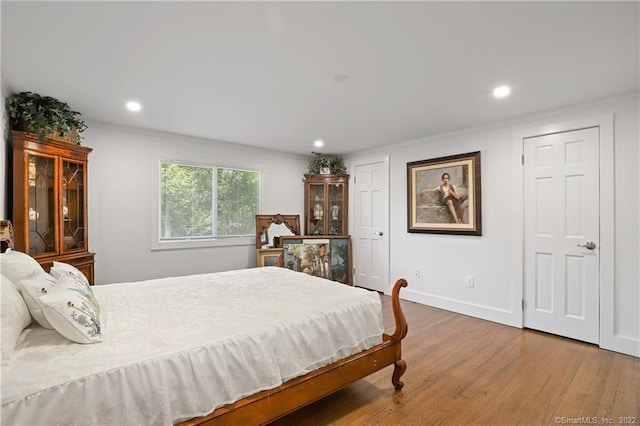 41 Hermit Ln, Westport, CT 06880 - bedroom featuring recessed lighting, ornamental molding, baseboards, and wood finished floors