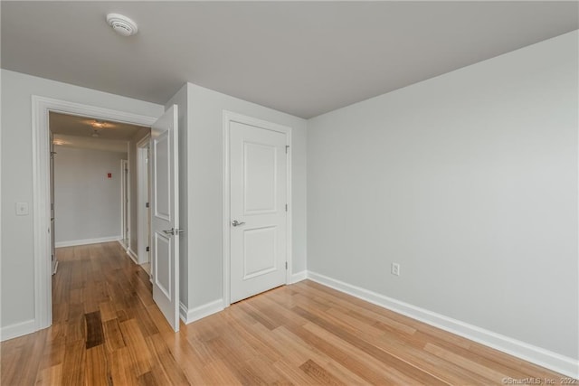 85 Memorial Rd Apt 414, West Hartford, CT 06107 - unfurnished room featuring baseboards and light wood-style floors