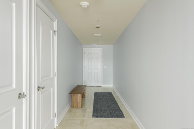 85 Memorial Rd Apt 414, West Hartford, CT 06107 - hall with visible vents, baseboards, and light tile patterned flooring