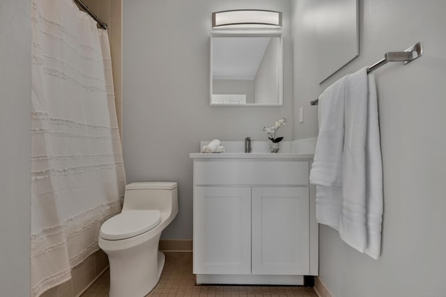full bathroom with curtained shower, baseboards, toilet, vanity, and tile patterned flooring