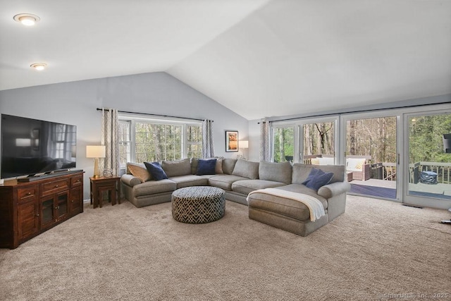 8 Gregory Ln, Simsbury, CT 06070 - carpeted living room featuring lofted ceiling and a healthy amount of sunlight