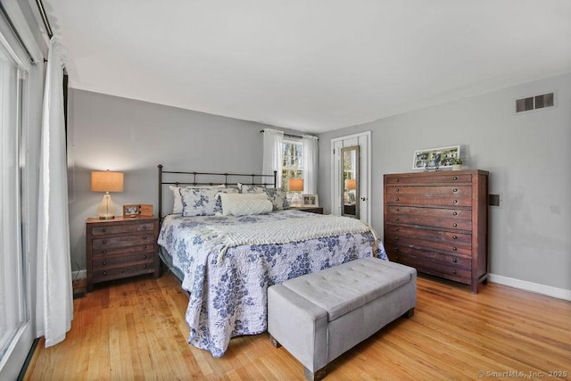 8 Gregory Ln, Simsbury, CT 06070 - bedroom featuring light wood finished floors, visible vents, and baseboards