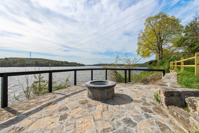 view of patio featuring an outdoor fire pit