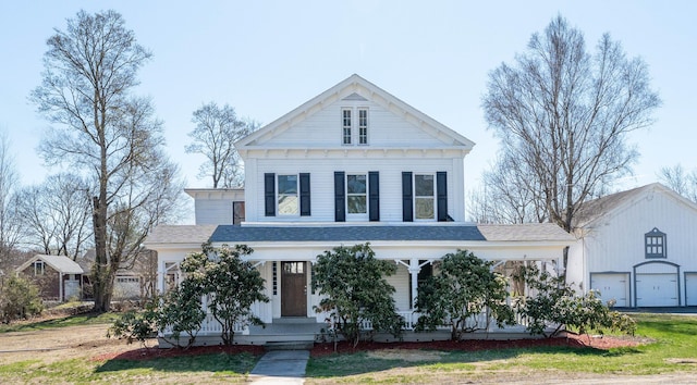 greek revival house with a porch, a garage, and a shingled roof