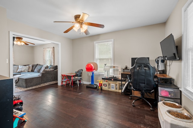 office area with hardwood / wood-style floors, a wealth of natural light, and a ceiling fan
