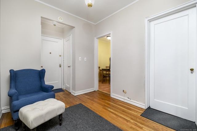70 Strawberry Hill Ave Apt 3-2A, Stamford, CT 06902 - living area with wood finished floors, ornamental molding, and baseboards