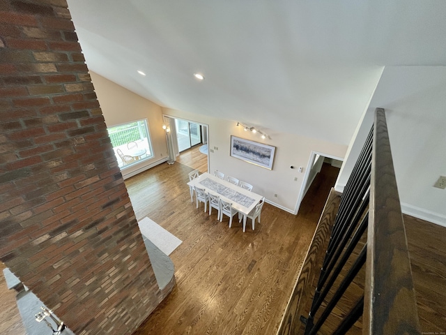205 Arch Bridge Rd, Bethlehem, CT 06751 - living area featuring wood finished floors, baseboards, and vaulted ceiling