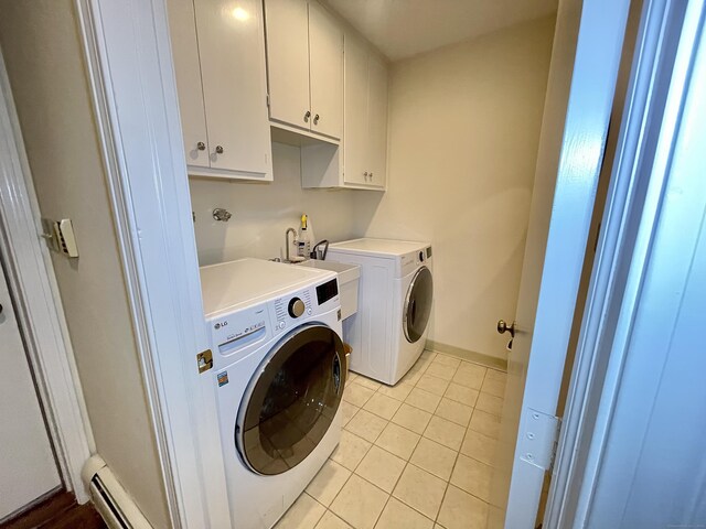 205 Arch Bridge Rd, Bethlehem, CT 06751 - laundry area with cabinet space, washing machine and dryer, light tile patterned flooring, baseboard heating, and baseboards