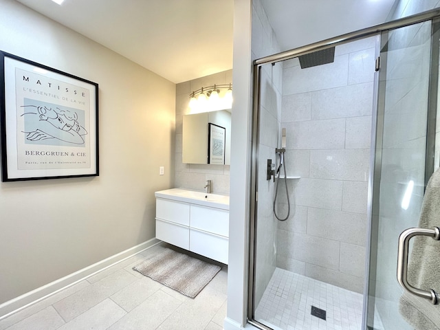 205 Arch Bridge Rd, Bethlehem, CT 06751 - full bath featuring vanity, a stall shower, baseboards, and tile patterned floors