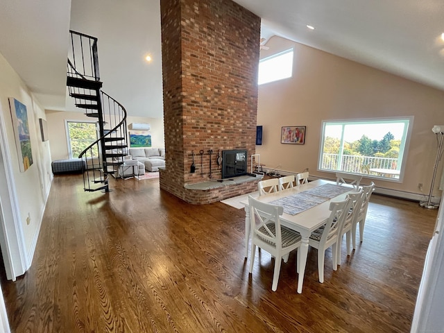 205 Arch Bridge Rd, Bethlehem, CT 06751 - dining space with high vaulted ceiling, stairs, wood finished floors, and baseboards