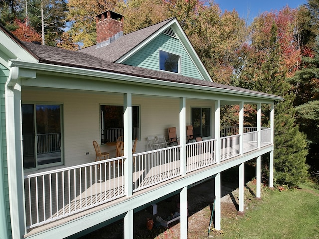 205 Arch Bridge Rd, Bethlehem, CT 06751 - view of home's exterior featuring a shingled roof and a chimney