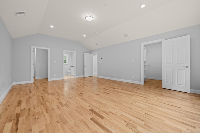 54 Edgerton Rd, Granby, CT 06090 - unfurnished bedroom with a spacious closet, vaulted ceiling, light wood-style floors, connected bathroom, and recessed lighting