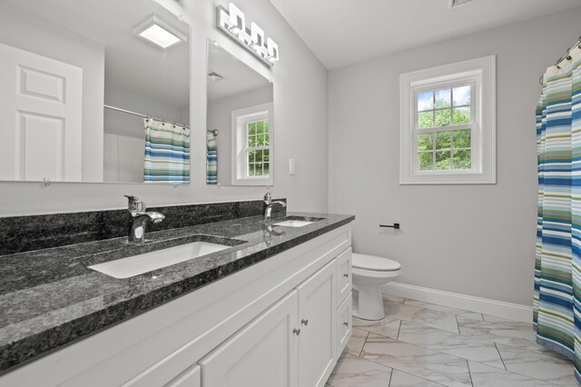 54 Edgerton Rd, Granby, CT 06090 - full bathroom featuring marble finish flooring, double vanity, and curtained shower