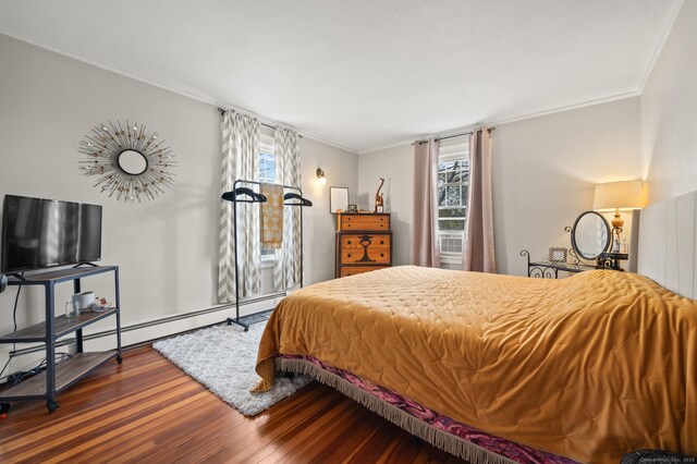 16 Academy St, Manchester, CT 06040 - bedroom with multiple windows, crown molding, and wood finished floors