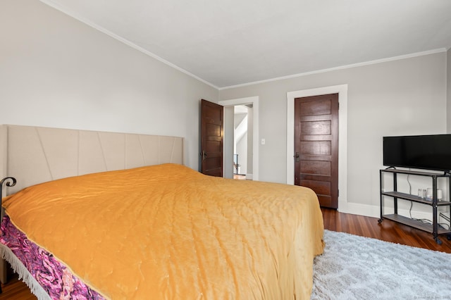 16 Academy St, Manchester, CT 06040 - bedroom featuring baseboards, wood finished floors, and ornamental molding