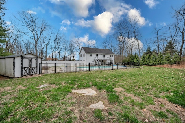 394 Woodhaven Rd, Glastonbury, CT 06033 - view of yard with a fenced backyard, a storage unit, an outdoor structure, and a fenced in pool