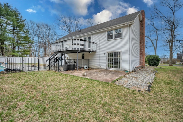 394 Woodhaven Rd, Glastonbury, CT 06033 - rear view of house featuring a wooden deck, a patio area, a lawn, and fence