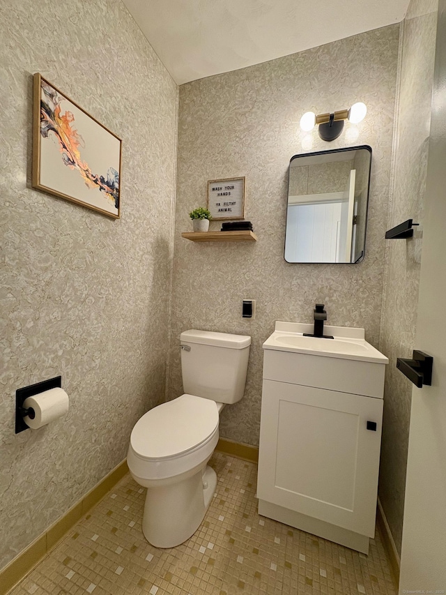 64 Sherwood Ln, Norwich, CT 06360 - bathroom featuring toilet, baseboards, tile patterned floors, and vanity
